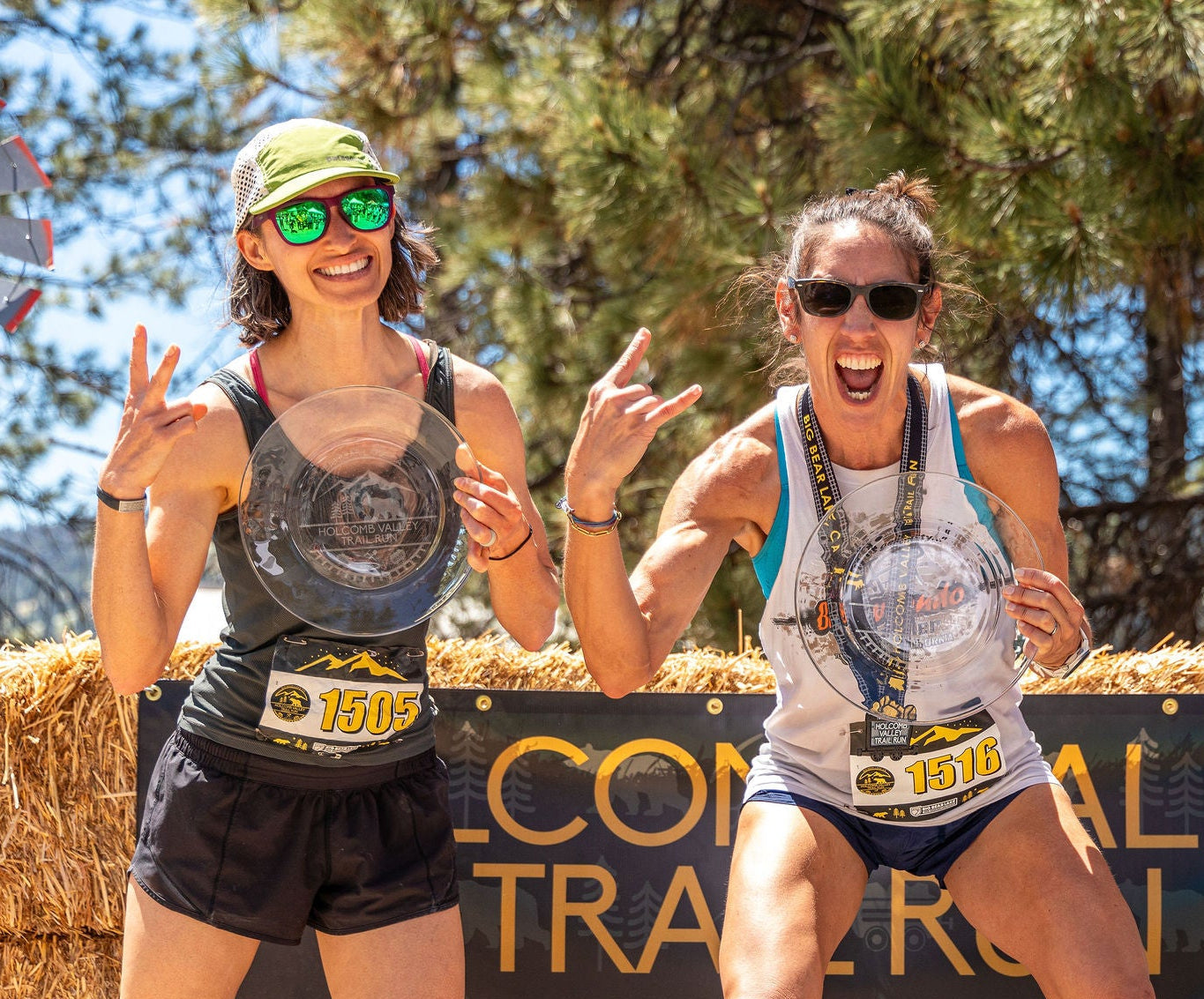 Two female ultra runners on the podium of an ultra marathon